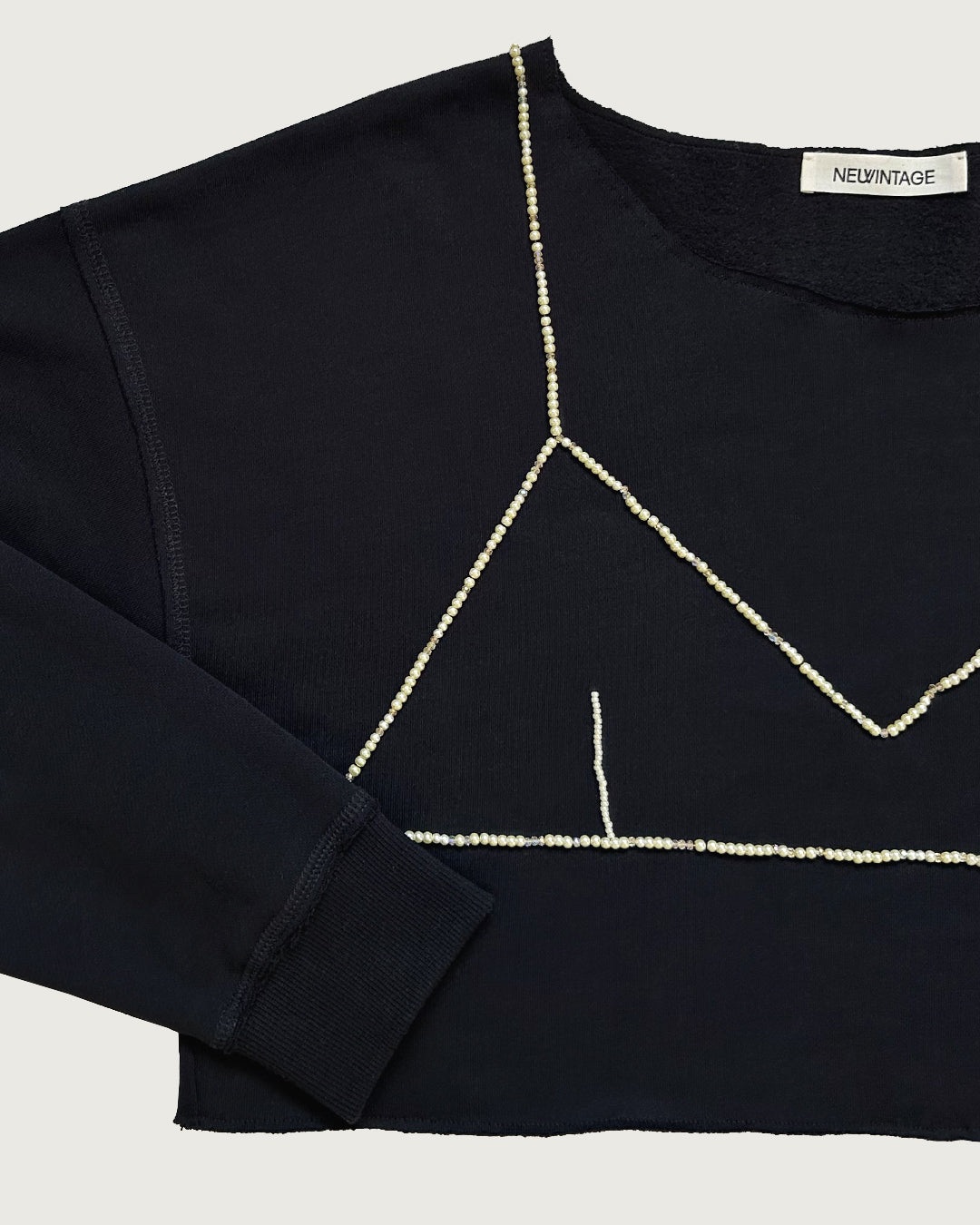 Upcycled oversized cropped sweatshirt with hand beaded bra